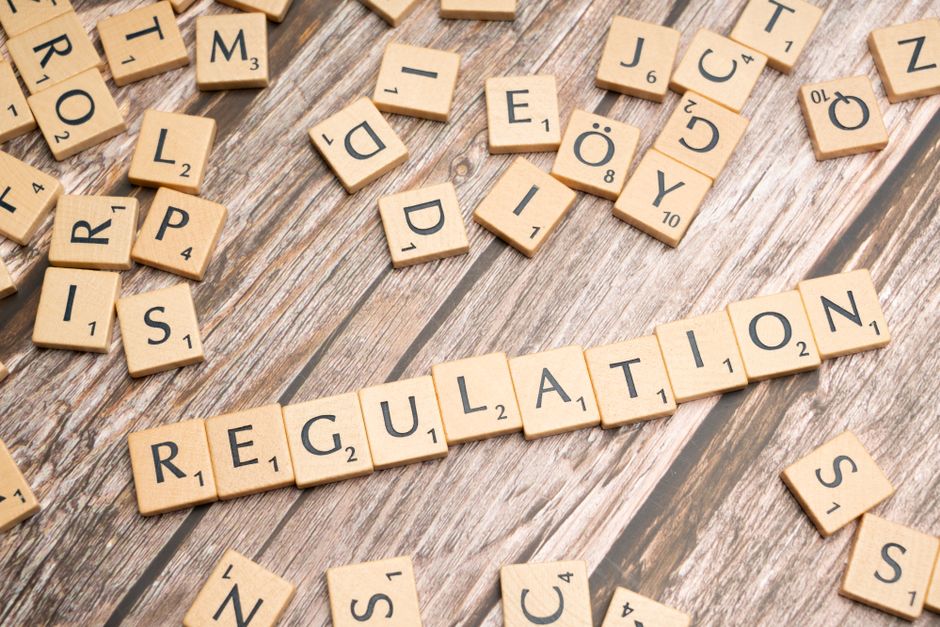 An intricate infographic illustrating AI compliance, featuring interconnected gears, legal documents, and a checklist with tick marks, emphasizing the detailed process businesses must undertake to meet EU AI Act requirements.