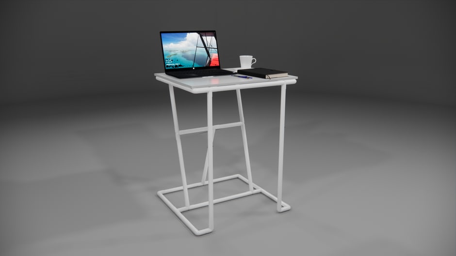 A modern, minimalist folding desk tucked into a corner of a studio apartment, ready to be collapsed when not in use, illustrating a practical home office setup for small rooms.