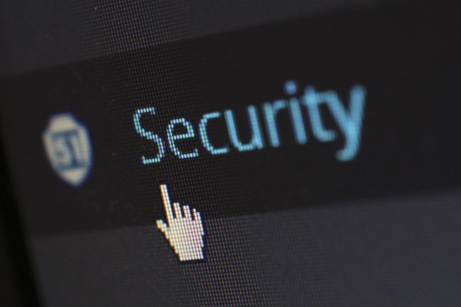 A glowing digital vault door with a large padlock, representing the secure storage provided by a password manager and cyber security.