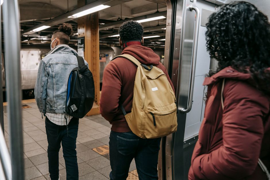 Montage of young people from different regions (Europe, North America, South America) on buses, subways, and parks, all engaged with their phones.