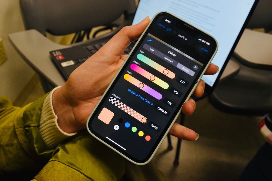 A close-up shot of hands navigating the settings menu of a smartphone, indicating active customization of digital wellness features.