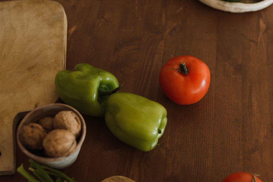 A vibrant array of fresh, healthy foods, including fruits, vegetables, fish, and whole grains, artfully arranged on a wooden table, representing nutritious fuel for recovery.