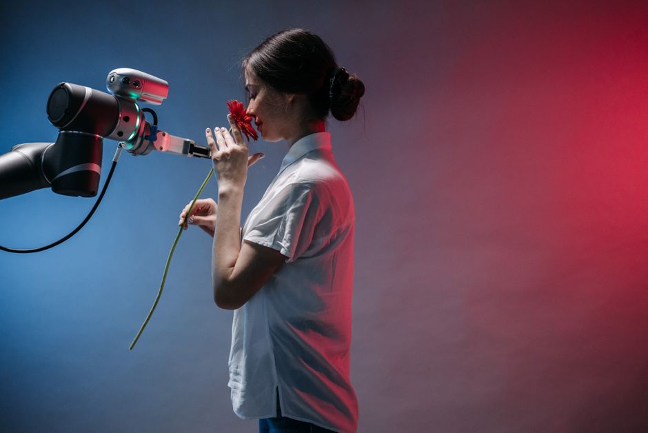 A person interacting with a holographic interface showing an AI assistant, symbolizing human-AI collaboration in information retrieval.