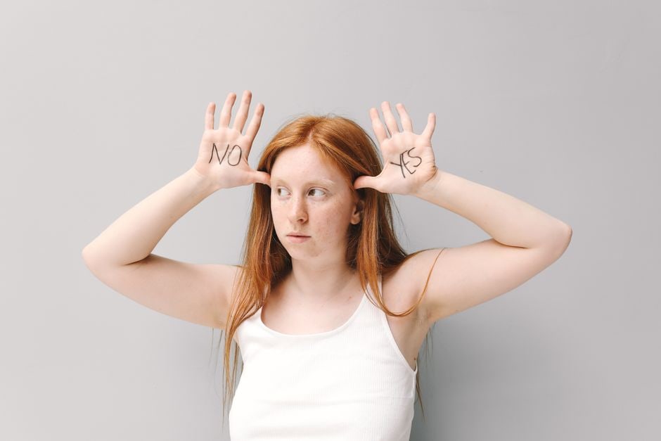 A person standing at a crossroads, surrounded by various thought bubbles representing different AI tool subscriptions and their potential benefits, illustrating the challenge of choosing wisely.