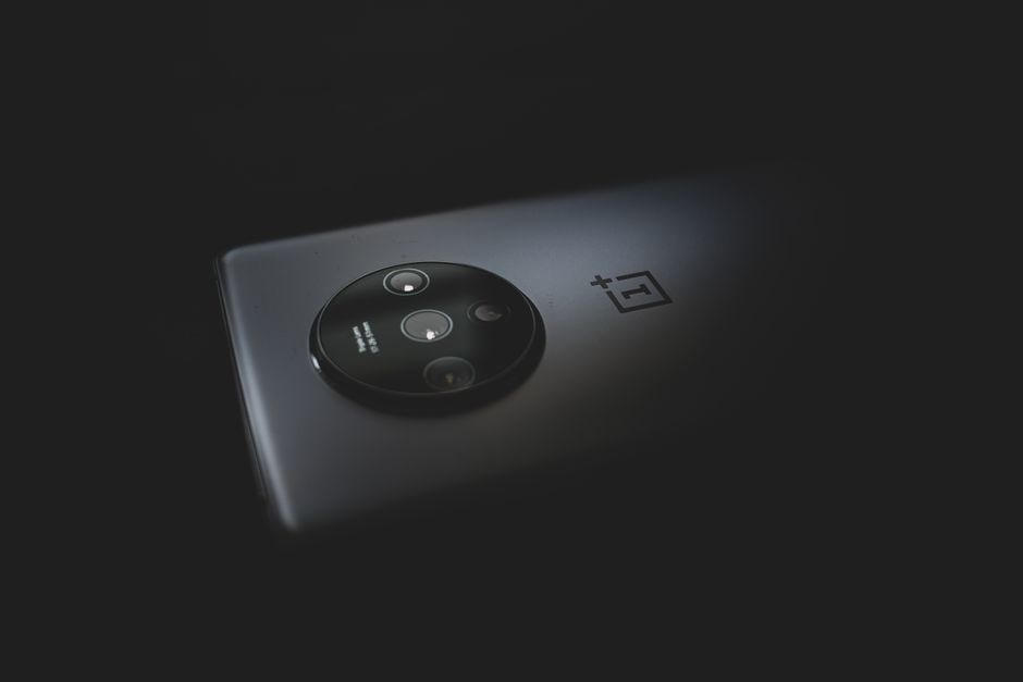 Close-up of a smartphone's multi-lens camera system, highlighting the advanced photography features.