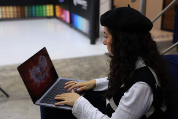 A student in a modern library setting, using a laptop, with abstract AI interface elements overlaid, symbolizing the integration of AI tools for study.